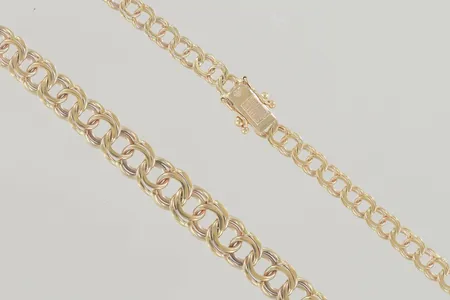 	Halskedja längd 39,5 cm bredd 4-7,4 mm, 18K  Vikt: 19 g