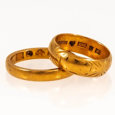 Graverat guld 23K 12,3g.