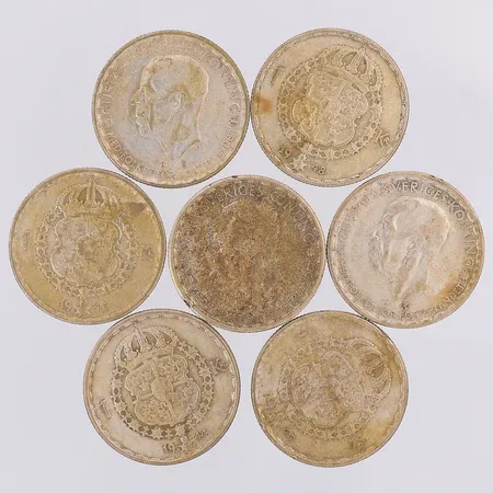 7 mynt Gustaf V nominellt värde 1kr, silver 400/1000 Vikt: 48,8 g