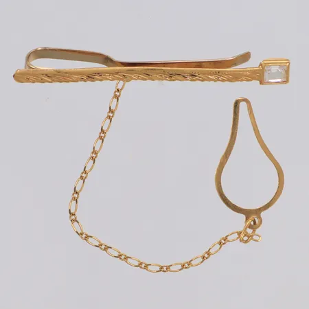Slipshållare med vit sten, längd 45mm, 18K Vikt: 2,8 g