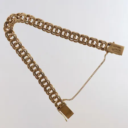 Armband Bismarck längd ca 18,5cm bredd 9mm Boliden säkerhetskedja 18K. Vikt: 25,6 g