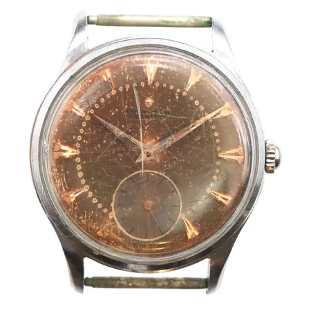 Herrur Zenith, 36mm, stål, manuell, boettnr: 9227378, verknr: 4405418, liten sekundvisare, repigt plexiglas, skadad urtavla, saknar länk, repig boett, inga tillbehör