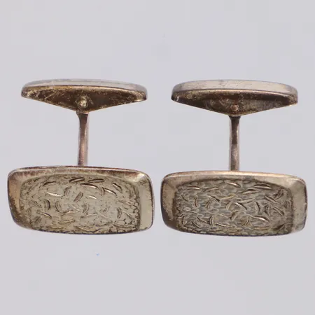 Ett par manschettknappar, längd 20,7mm, Stig Järvinen Helsingfors, år 1967, 813/1000 silver Vikt: 10,8 g