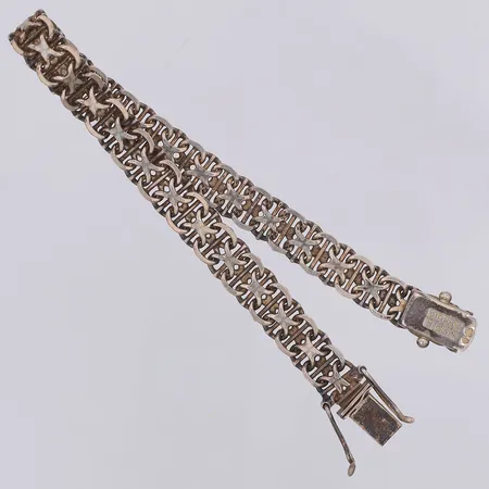Armband X-länk längd 19cm bredd 7,8mm NSE Guldvaru Aktiebolag 1980, silver 830/1000 Vikt: 13,9 g
