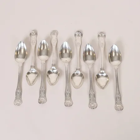 Nio dessertskedar modell "Engelsk Snäck", längd 15cm, Gustaf Fredrik Richter och Jonas Wilhelm Laurén, 1849-59, gravyr, silver 830/1000. Vikt: 192,1 g