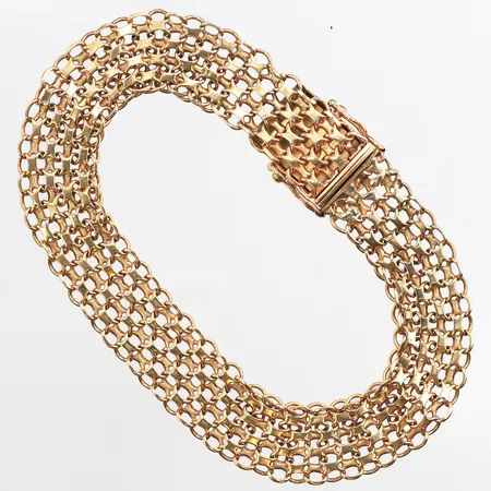 Armband x-länk, längd ca 19cm, bredd ca 11,2mm, 18K. Vikt: 18,1 g