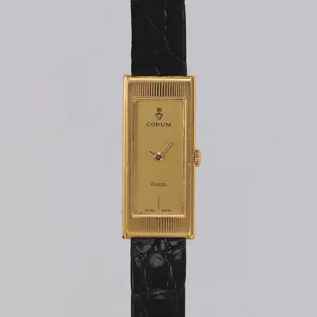Damur Corum 18K, vintage, quartz, Cal.751E, batteribyte krävs, 33,5x15mm, läderband original, spänne i gulddoublé, servicekvitto Rob Engström 2018