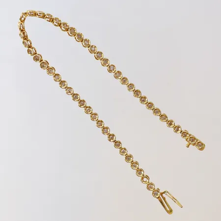 Tennisarmband med åttkantslipade diamanter 50 x 0,02ct en diamant saknas, längd 17,5cm bredd 3mm 18K Vikt: 7,9 g