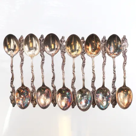 12 Silverskedar, längd ca 10cm, 830/1000 silver. Vikt: 132,5 g