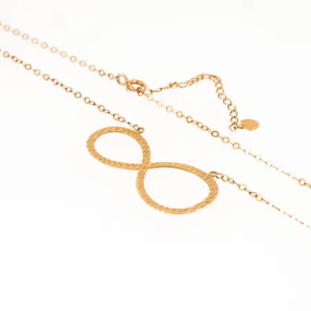 Collier med integrerat hänge "evighetssymbol" längd justerbar 42-48cm bredd 1,7mm, hängets mått 37,5x17mm, ojämnheter på hänge, 18K 2,7g. 
