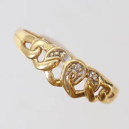 Ring med åttkantslipade diamanter 3 x 0,005ct stl:16½ bredd 6mm 18K Vikt: 1,5 g