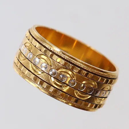 Ring med rörliga delar stl:18 bredd 8,8mm 21K Vikt: 7 g