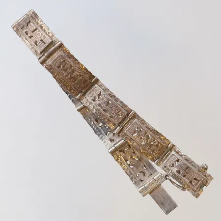 Armband med genombruten mönsterdekor längd 18cm bredd 10mm silver 925/1000 Vikt: 18,8 g