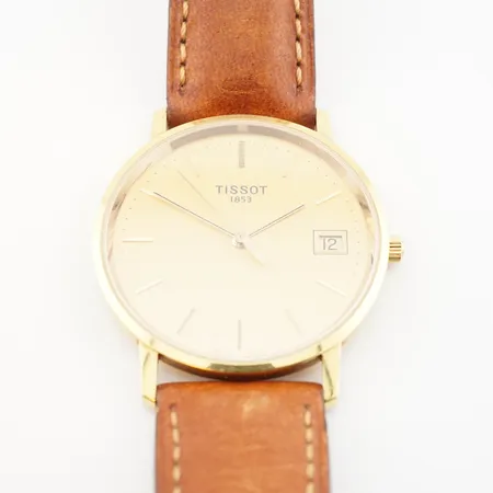 Herrur Tissot, ca 33,5mm, quartz, 18k, gravyr bakboett, batteribyte krävs