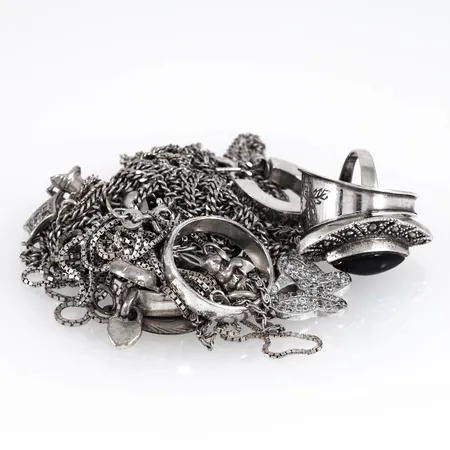 Diverse defekt/graverat silver 65,4g. 