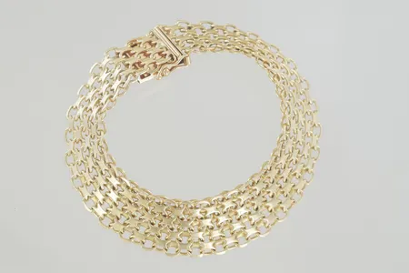 Armband längd 18,5 cm bredd 1,5 cm, 18K  Vikt: 25,5 g