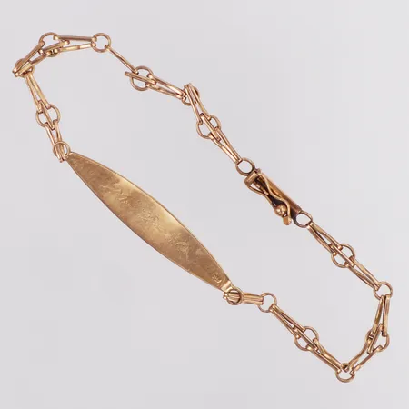 Armband med namnbricka längd 20cm bredd 4,2-7,3mm, gravyr roséfärgad missfärgat lås 18K Vikt: 5 g