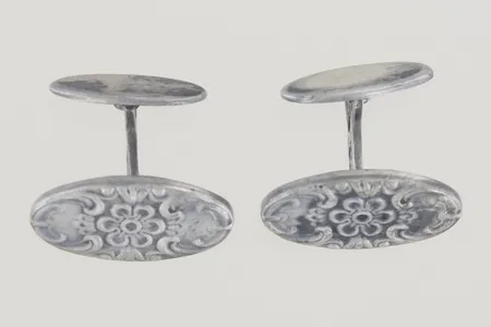 Ett par manschettknappar bredd 2,2x1,2 cm, silver   Vikt: 11,9 g
