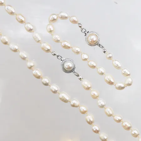Collier och armband odlade sötvattenspärlor, lås i vitmetall, längd ca 19-59cm, Ø ca 8mm.