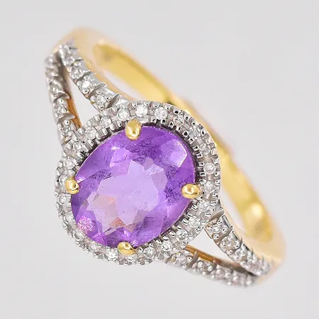 Ring diamanter 0,10ctv stl:18 troligen ametist GHA 18K Vikt: 4,5 g