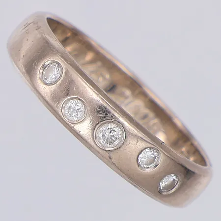 Ring vitguld diamanter 0,11ctv & W/SI enligt gravyr stl:16¼ Wadring-Juvel HB, gravyr, 18K Vikt: 3,6 g