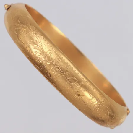 Stelt armband, ihåligt, öppningsbart, Ø60mm, bredd 11,3mm, bucklor, 18K Vikt: 16,9 g