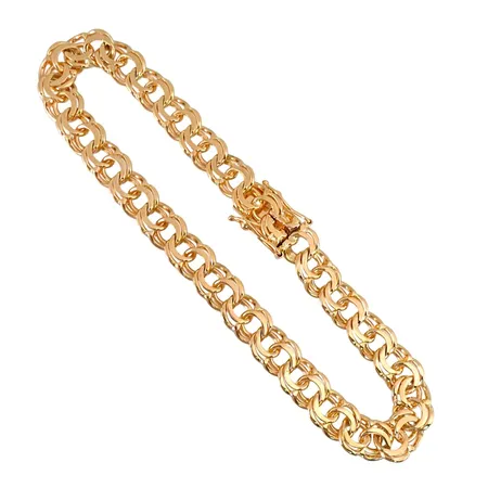 Armband Bismarck i 18K guld, M.K:S Guldsmedsatelier Ab, svensk kontrollstämpel, längd knäppt 18,5 cm, bredd 6,3 mm, fint skick Vikt: 14,7 g