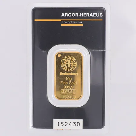 Guldtacka Argor-Heraeus Schweiz, bruten förpackning, borrad, 24K Vikt: 10 g