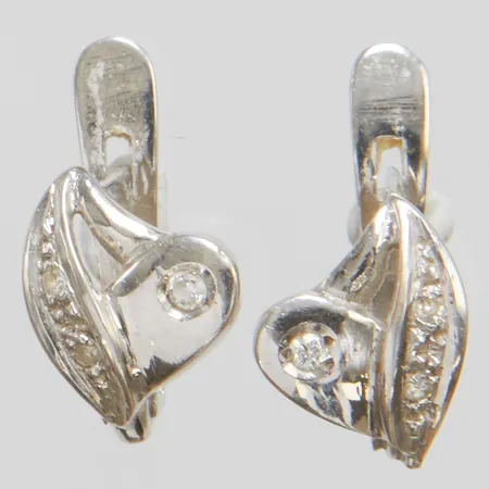 Örhängen med diamanter 2 x ca.0,01ct samt 4 x ca.0,005ct, 10x7,3mm, GFAB, vitguld, 18K Vikt: 1,6 g