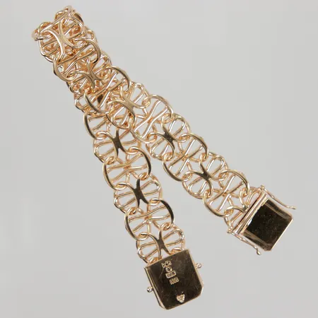Armband X-länk variant, 18cm, bredd 15mm, Clareus AB år 1983, 18K Vikt: 36,9 g