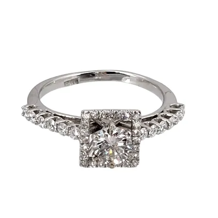 Diamantring i 18K vitguld, Diamanter 1 x 0,45ct (ca SI2) + 12 x 0,02ct + 24 x 0,005ct, hög uppbyggd fattning (8 mm), utrikiska stämplar, stl:16¼ mm, bredd 1,5 - 8 mm, fint skick Vikt: 3,1 g