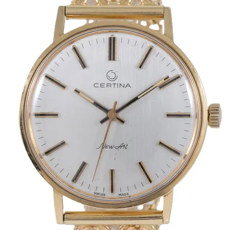 Herrur Certina New Art guld 18K manuell Ø33,5mm, plexiglas, urband X-länk med stav, guld 18K, total längd 17,5cm bredd 15,5mm, bruttovikt 51,7g. Urband i svart läder medföljer.