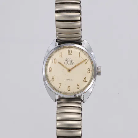 Herrur Leijona, Ø31,2mm, stålbaksida, manuell, boettnr 31533, repor, nagg, flexband.