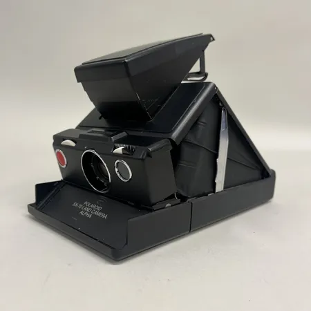Polaroidkamera SX-70 model 2 Alpha, refurbished by Impossible, ej funktionstestad, bruksslitage, kartong