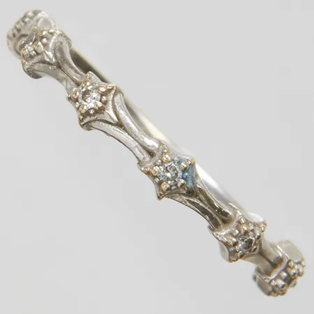 Ring med diamanter 7 x ca.0,01ct, stl:19¼, bredd: 1,7-3,3mm, rodierat guld, behov av rodiering, 18K Vikt: 2,1 g
