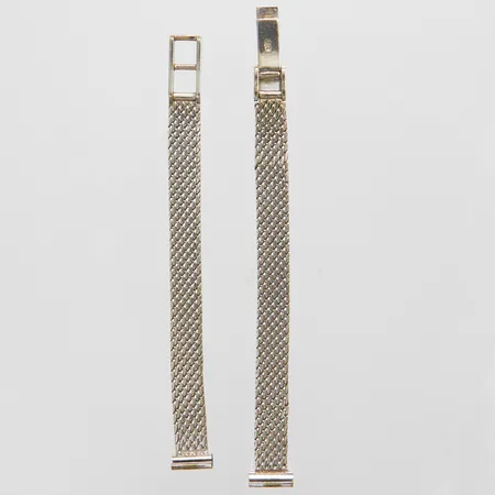 Klocklänk längd: 8,3+7,7mm, bredd: 5,7mm, länkfäste 8mm, 18K Vikt: 12,8 g