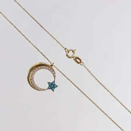 Collier med integrerat hänge med vita och turkosa stenar längd 42,5cm bredd 0,5-17,5mm 14K. Vikt: 2 g