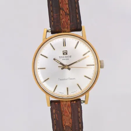 Herrur Tissot Seastar Seven 18K manuell Ø33,5mm, slitet läderarmband, yrkesgravyr, inga tillbehör