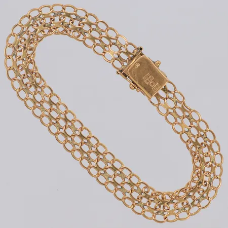 Armband X-länk, längd 19cm bredd 8,9mm, en låsåtta saknas 18K Vikt: 11,9 g