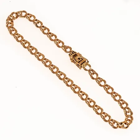 Armband Bismarck längd 19,8cm bredd 4,3mm, väldigt slitna länkar närmast låset, 18K 6,6g. 