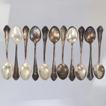 11 kaffeskedar, längd 12,5cm, modell Eva, oxiderade, 830/1000 silver Vikt: 178 g
