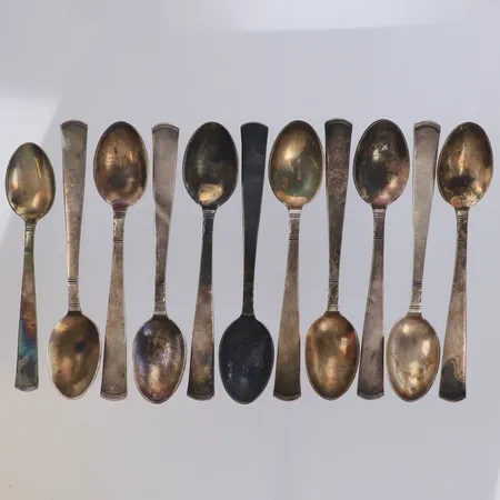 11 kaffeskedar, modell Rosenholm, GAB, oxiderade, 830/1000 silver Vikt: 171,1 g