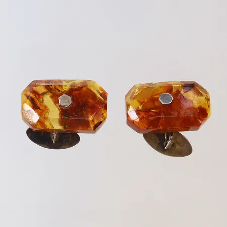 Ett par manschett knappar med troligen bärnsten 28x17mm silver 875/1000 bruttovikt:8,4g Vikt: 8,4 g