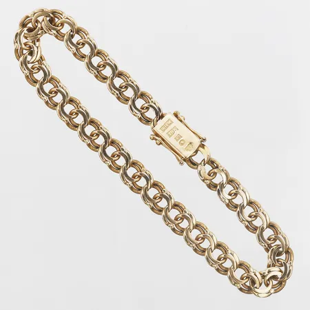 Armband Bismarck längd 19,5cm, bredd 7mm, 18K guld Vikt: 15,4 g