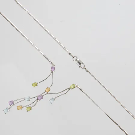 Collier med ametist, blå topas, citrin, samt peridot, längd: 40,7cm, bredd: 1,5mm, motivets längd: ca.61mm, något skevt motiv, vitguld, 18K Vikt: 8,1 g