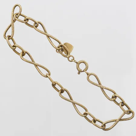 Armband med delvis matterade länkar, längd 19,5cm, bredd 6mm, italienska stämplar, 18K guld Vikt: 3,7 g