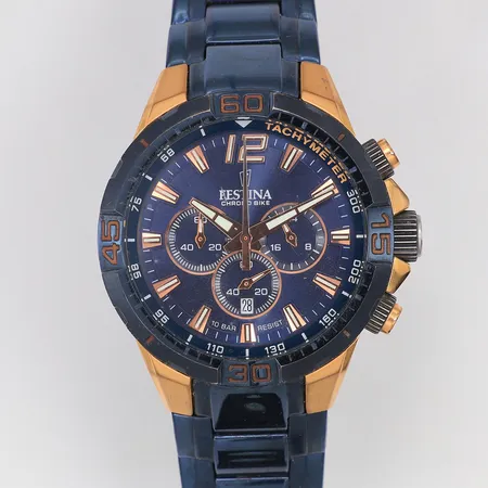 Herrur Festina Chrono Bike Special Edition blå stål guldfärgade detaljer quartz Ø44,3mm, F20524, sapphire glas, original stållänk 15cm, extra armband blå gummi, två extra länkar, batteribyte krävs, box Skickas med postpaket.