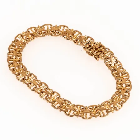 Armband X-länk längd 19cm bredd 8mm, 18K 15,6g.