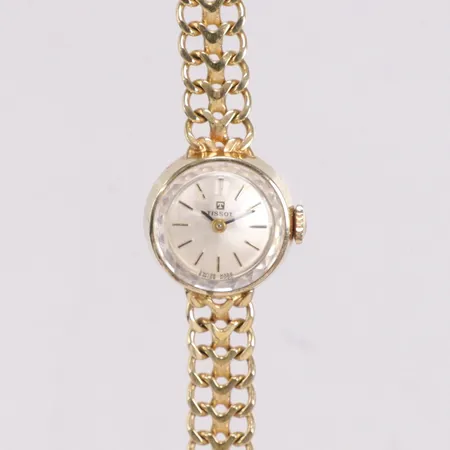 Damur Tissot helguld integrerad x-länk längd 17cm bredd 7,8mm 18K Vikt: 20,7 g