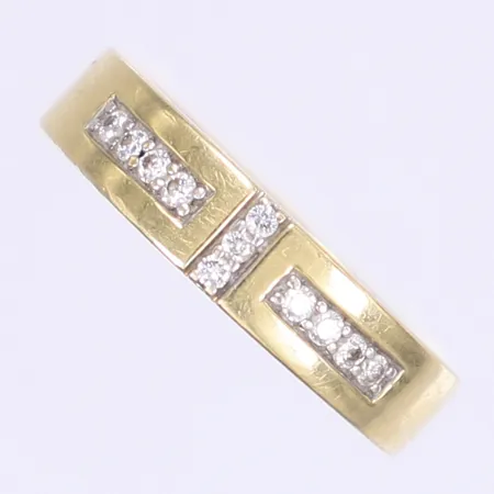 Ring med diamanter totalt 12xca 0,01ct stl:18¼ bredd 5mm tillv. Guldfynd 18K Vikt: 4,5 g